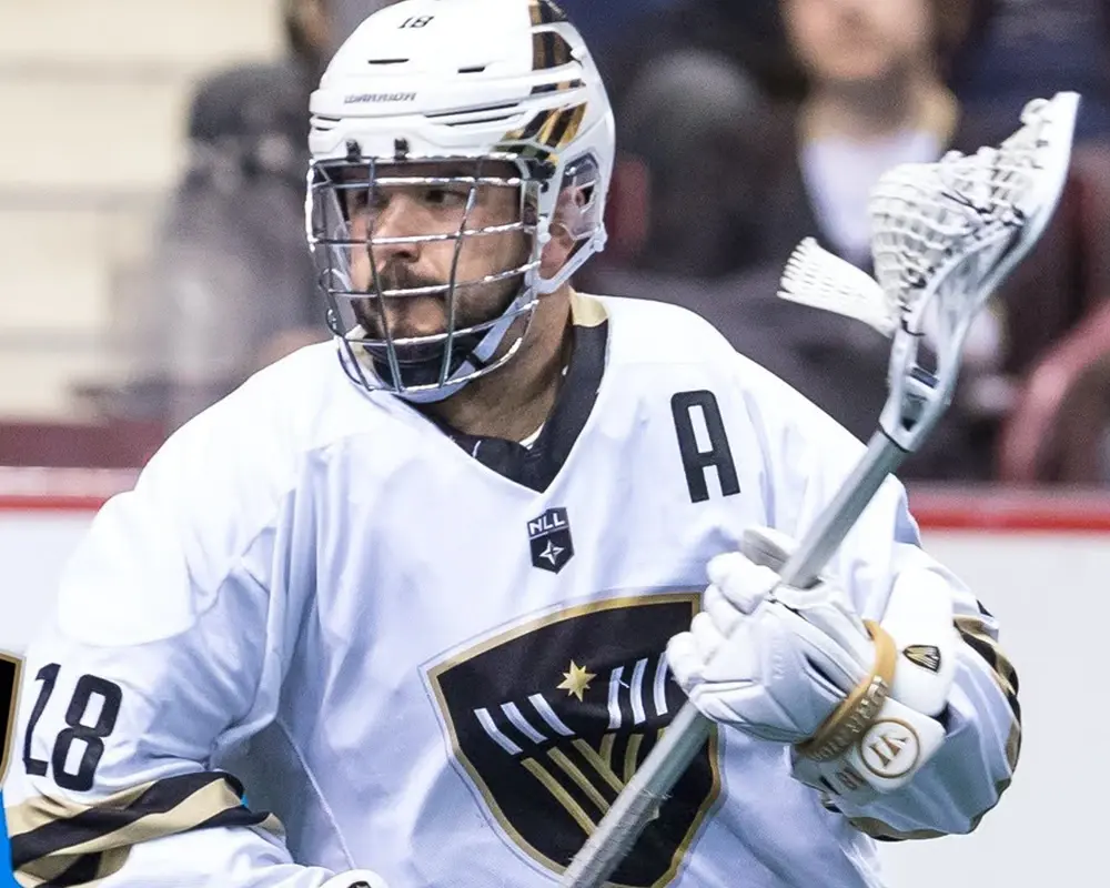 Logan Schuss playing lacrosse