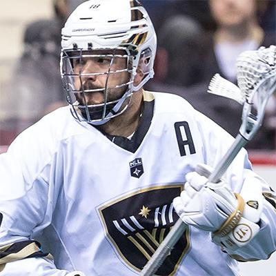 Logan Schuss playing lacrosse